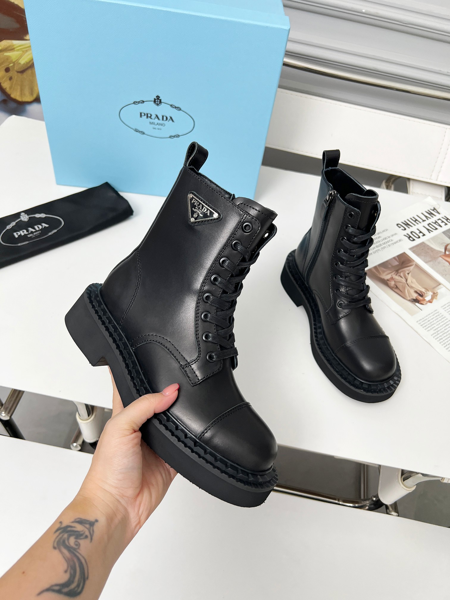 Prada Classic Triangle Martin Boots